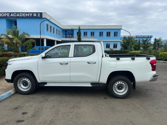 Hon. Musa Hassan Bility Donates Pickup Truck to the Clar Hope Foundation